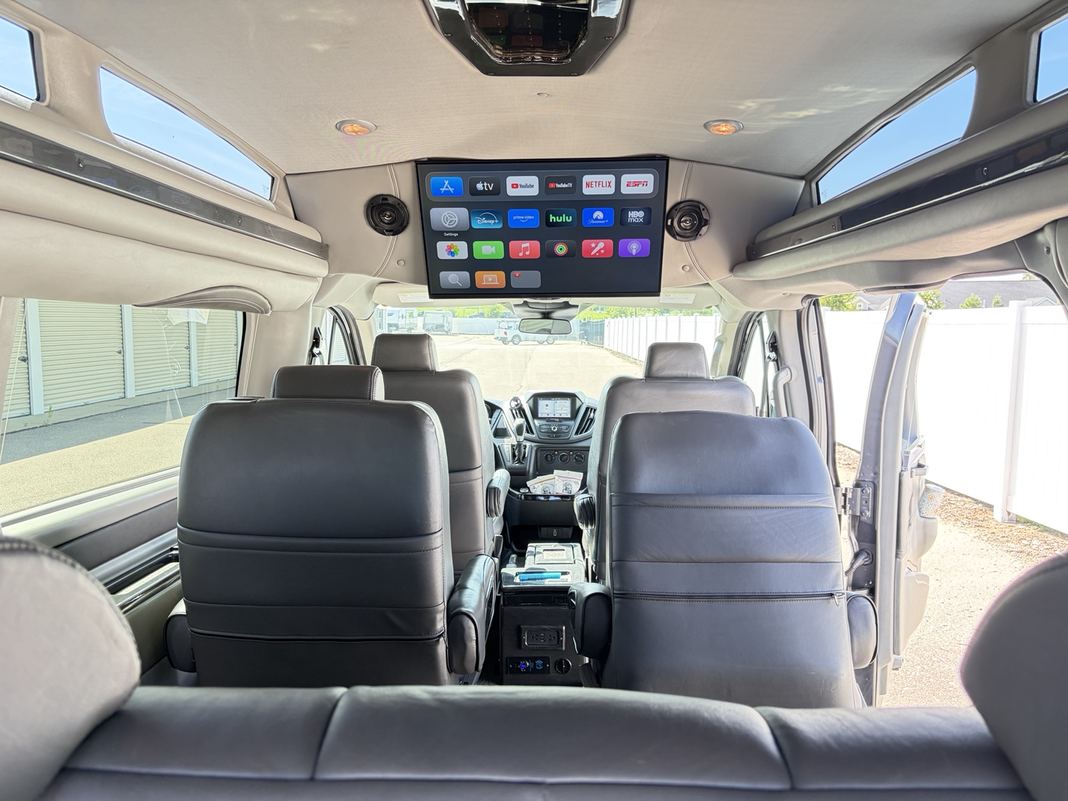 Passenger cabin viewed from the rear sofa
